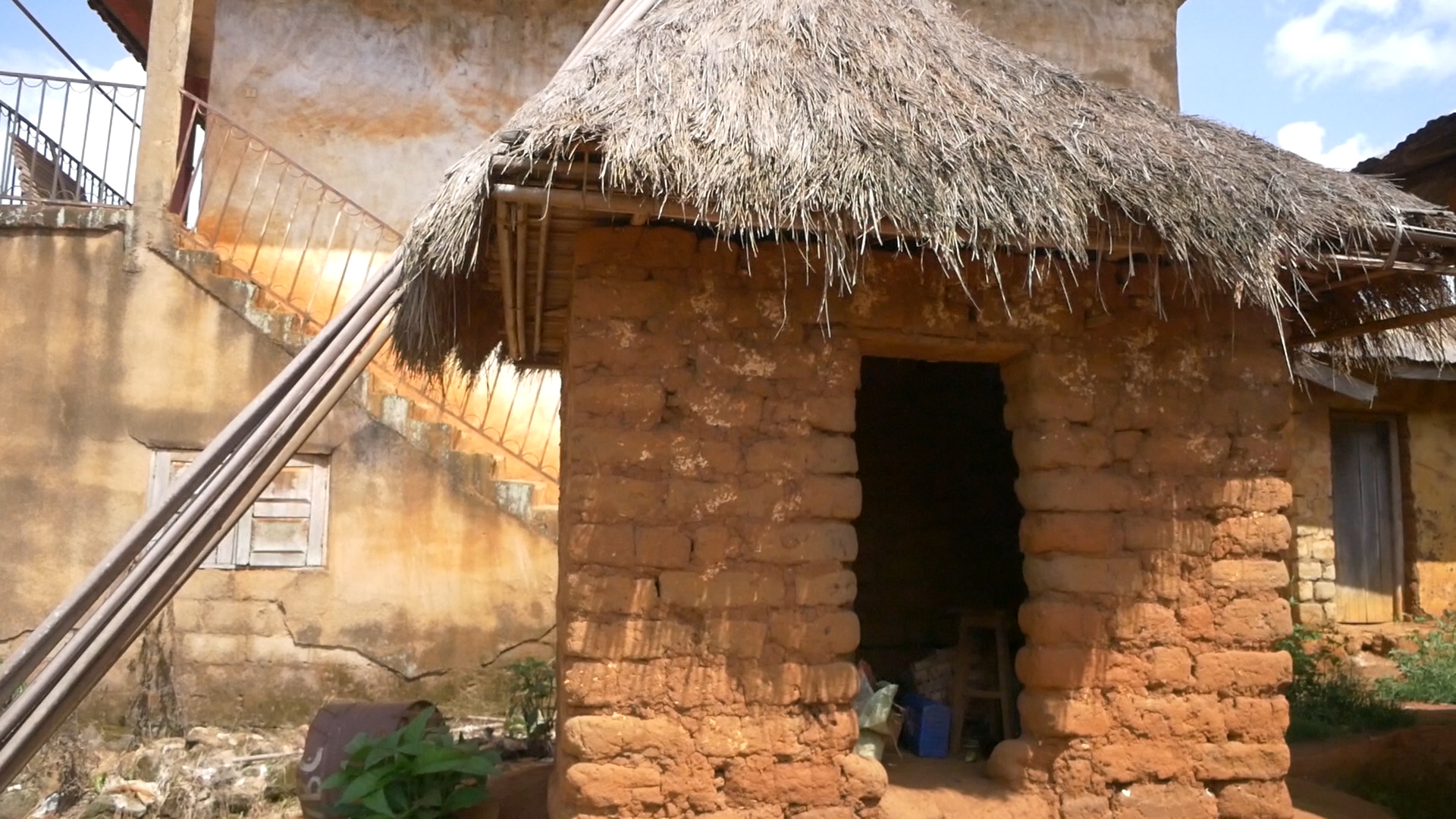 Small grass-roofed shrine hut at Muangwane